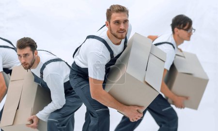 Photo for Responsible movers in a hurry to do their job. - Royalty Free Image