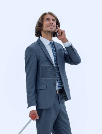 Foto de "hombre de negocios con equipaje hablando en un teléfono celular
." - Imagen libre de derechos