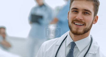 Photo for "smiling doctor on blurred background" - Royalty Free Image