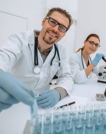 Photo for "background image.scientists working in the laboratory" - Royalty Free Image