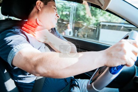 "A driver with neck pain, concept of a man in his car with neck pain. An exhausted driver with neck pain in traffic, A person with neck pain in traffic"