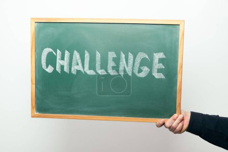 Photo for "chalkboard with CHALLENGE handwritten in chalk" - Royalty Free Image