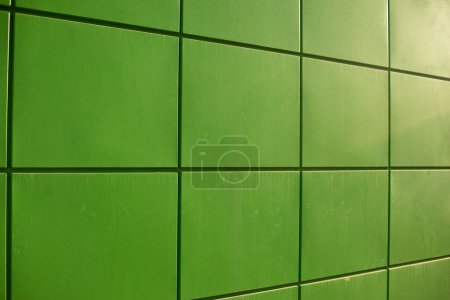 Photo for "Green panels. Architecture details. Modern building. Store cladding." - Royalty Free Image