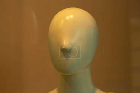 Photo for "The face of the mannequin without details. Plastic head to show clothes. Mannequin with nose." - Royalty Free Image