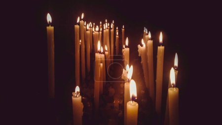 Photo for Church candles lit close up - Royalty Free Image