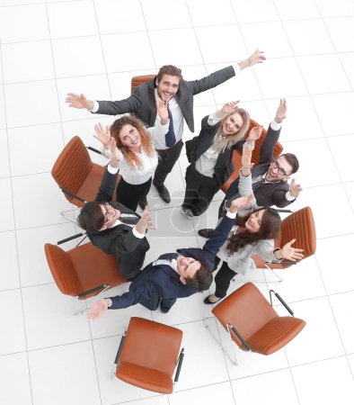Photo for View from the top. business team with their hands up. - Royalty Free Image