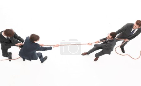 Photo for "top view.a tug of war between business teams" - Royalty Free Image