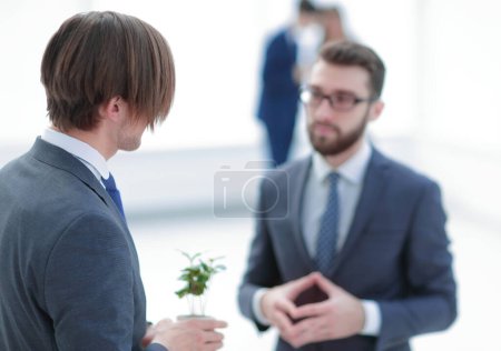 Photo for "background image. business partners talk" - Royalty Free Image