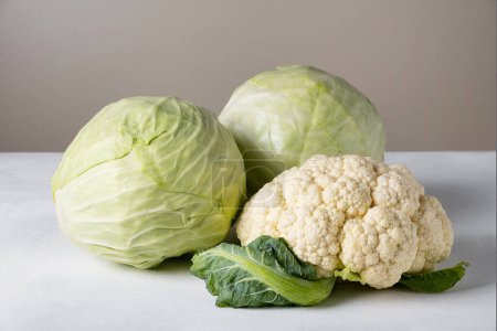 Photo for Two heads of white cabbage and a head of cauliflower - Royalty Free Image