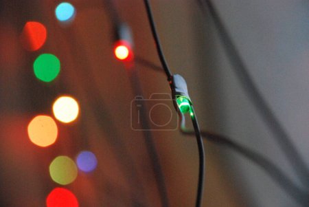 Photo for LED lights garland on the window. - Royalty Free Image