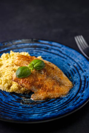 Photo for "spicy fillet of white cod with couscous" - Royalty Free Image