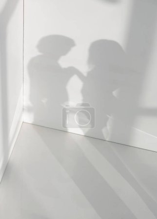 Photo for White room with dim shadow couples.background. - Royalty Free Image