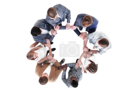 Foto de "top view.the equipo de negocios sostiene las manos del otro" - Imagen libre de derechos