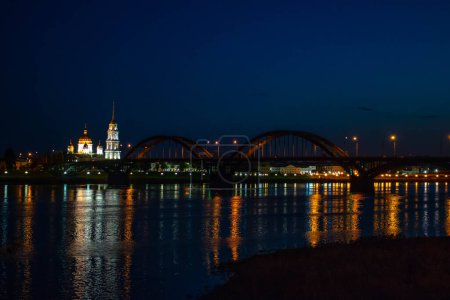 Photo for "Bridge across the river at night in Rybinsk Russia" - Royalty Free Image