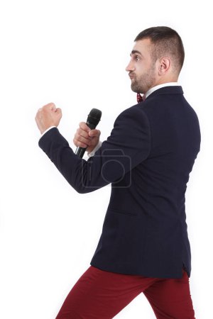 Téléchargez les photos : "Intelligent bel homme drôle avec un microphone, boxe" - en image libre de droit