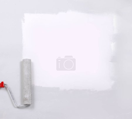 Photo for "square painted white with the paint roller, on a white sheet" - Royalty Free Image
