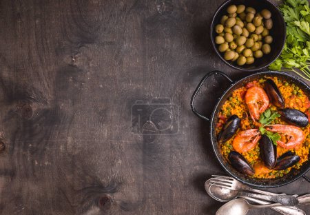 Photo for Paella on table background, close up - Royalty Free Image