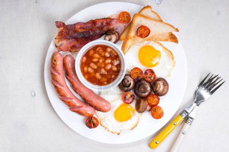 Photo for "Full english breakfast on plate" - Royalty Free Image