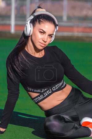 Photo for Cute girl enjoying music with headphones - Royalty Free Image