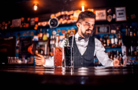 Photo for Bartender makes a cocktail at the public house - Royalty Free Image