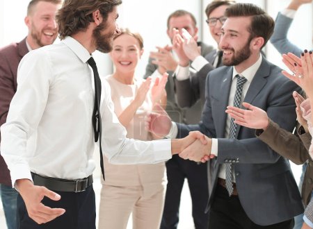 Photo for "business team congratulating each other on the victory" - Royalty Free Image