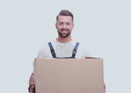 Photo for Man in workwear with cardboard box isolated on white background - Royalty Free Image