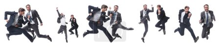 Téléchargez les photos : En pleine croissance. deux hommes d'affaires joyeux dansant - en image libre de droit