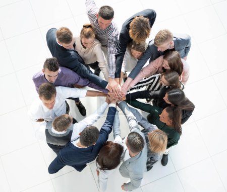 Photo for Top view. group of young business people showing their unity - Royalty Free Image
