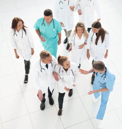 Photo for Top view. group of doctors discussing work issues. - Royalty Free Image