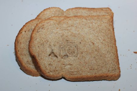 Téléchargez les photos : "Tranches de pain complet ou complet" - en image libre de droit