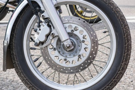 Foto de "Close-up of the front wheel of a motorcycle" - Imagen libre de derechos