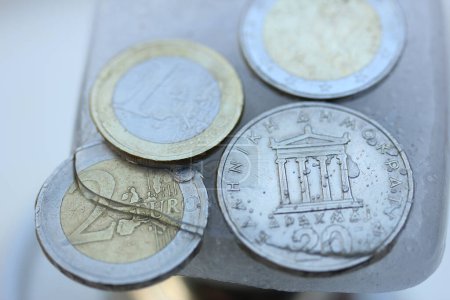 Photo for Frozen coins, close-up view - Royalty Free Image