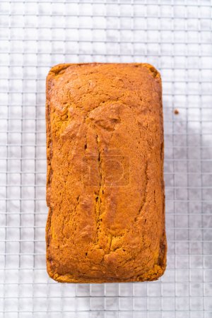 Photo for Homemade pumpkin bread on a white sheet - Royalty Free Image