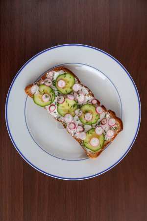 Photo for Sandwich with cucumber, tomato, onion and salad - Royalty Free Image