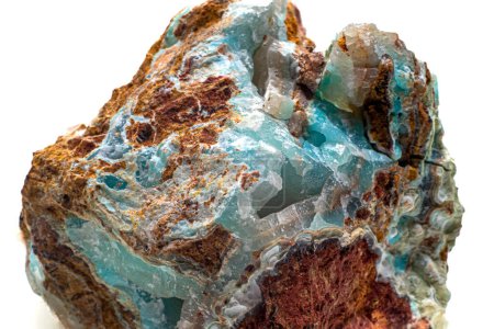 Téléchargez les photos : Macro-focused authentic Greek blue, white and brown smithsonite mineral, Glacier-like blue crystal isolated on a white surface background. Close up no shadow. - en image libre de droit