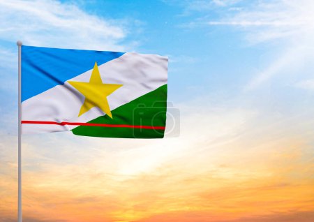Photo for 3D illustration of a Roraima flag extended on a flagpole and in the background a beautiful sky with a sunset - Royalty Free Image
