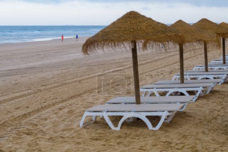 Photo for Hammocks on the beach of La Barrosa, Cadiz, Spain - Royalty Free Image