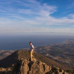 General view of a young man on top of Sierra Bermeja mountain, Malaga. High quality photo