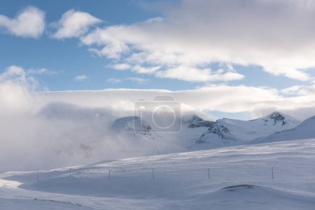 Low clouds rolling through the Swedish mountains near Sylarna on a ski tour