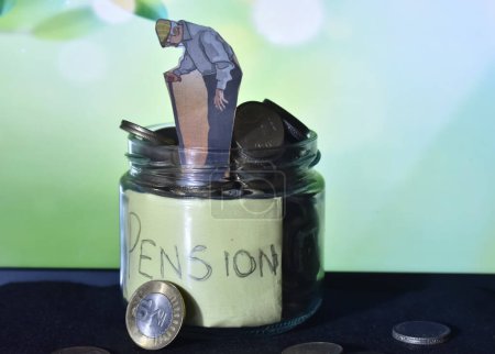 Photo for A closeup picture of a Image of an old standing on pension corpse with coins. Finance concept - Royalty Free Image