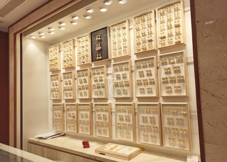 A picture of various gold jewellery in display in a Jewellery shop in India