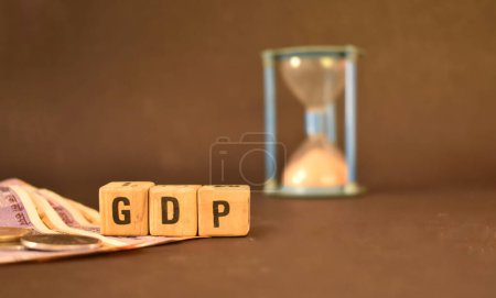 A close up picture of letters GDP representing gross domestic product. Financial theme.
