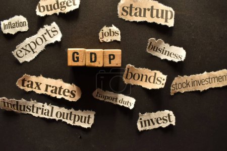 A close up picture of letters GDP representing gross domestic product. Financial theme.