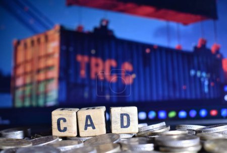 Ein Nahaufnahme-Bild von Buchstaben CAD, die das Leistungsbilanzdefizit darstellen. Ein Handelsdefizit ist normalerweise die größte Komponente eines Leistungsbilanzdefizits.