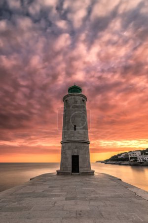 Foto de Scenic view of lighthouse in Cassis in south of France against dramatic sunset sky - Imagen libre de derechos