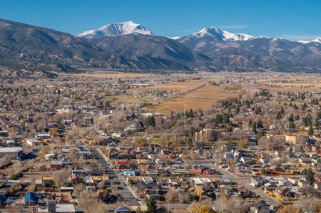 Photo for An elevated view of the neighborhoods of Salida, Colorado with a beautiful mountain backdrop from Tenderfoot Hill. - Royalty Free Image