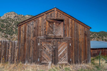 Photo for Doorway entrance to an old weathered barn somewhere in Colorado. - Royalty Free Image