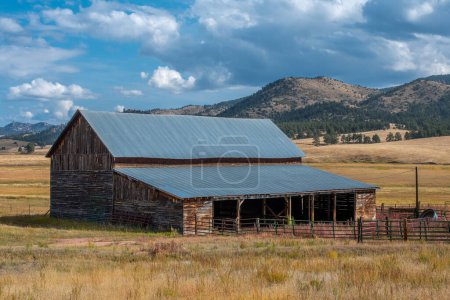 Photo for An old weathered barn from a former ranch is aging beautifully in the Front Range of the Colorado Rocky Mountains. - Royalty Free Image