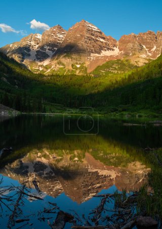 Photo for The Maroon Bells beautifully reflected in the clear waters of Maroon Lake near Aspen, Colorado. - Royalty Free Image