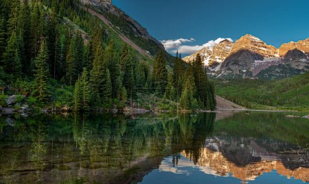 Photo for A beautiful shot of the famous Maroon Bells near Aspen, Colorado shortly after sunrise, before the sun lights up the canyon. - Royalty Free Image